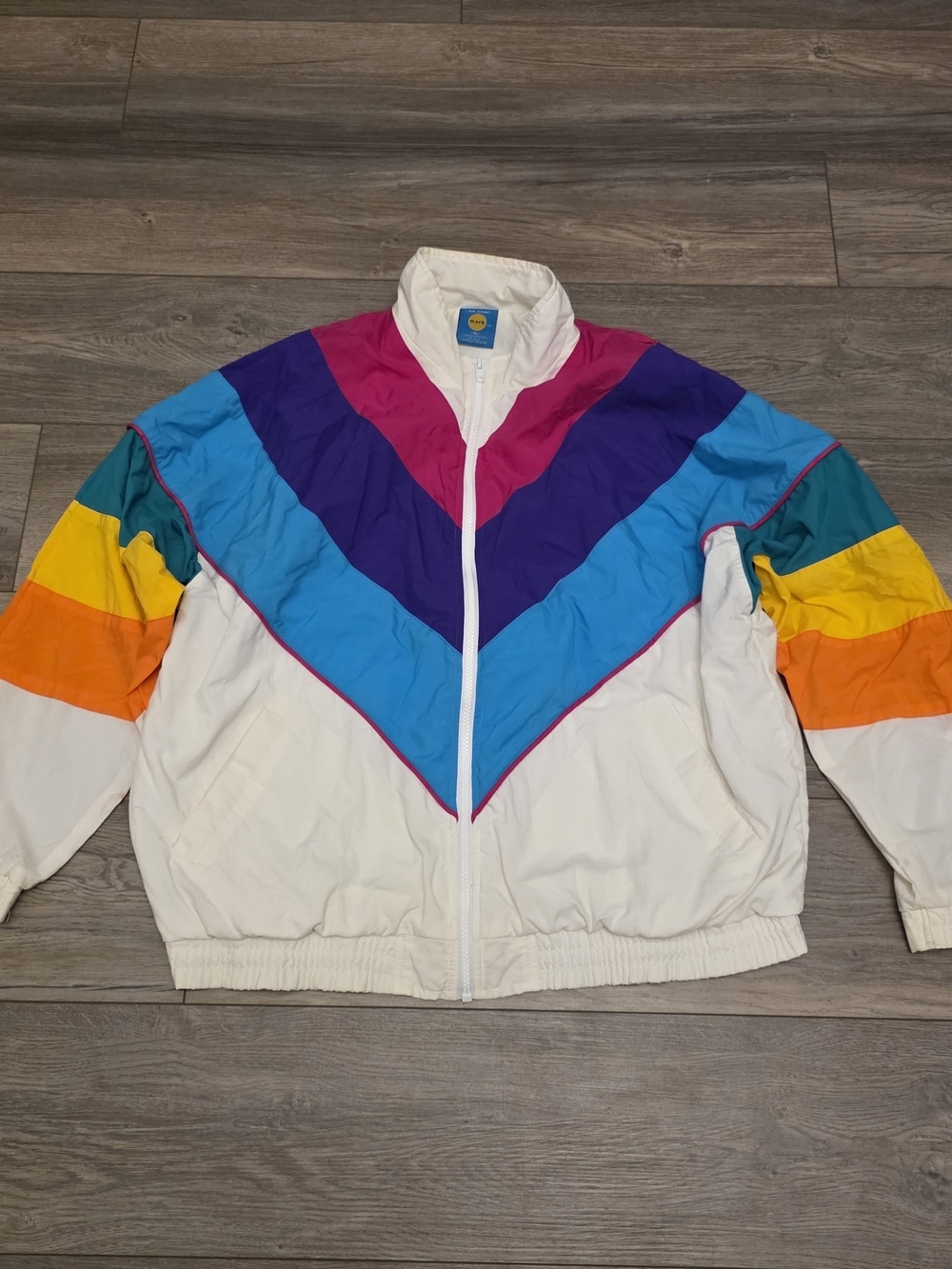 mark. White Bomber Jacket with Pink Purple Blue Teal Yellow and Orange Chevron